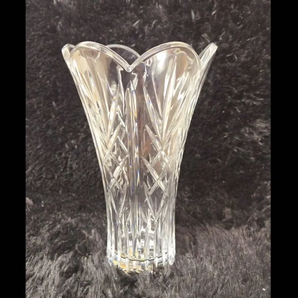24% Lead Crystal Vase. Standing 11” tall and a diameter of 6 1/2” top. Unique cu